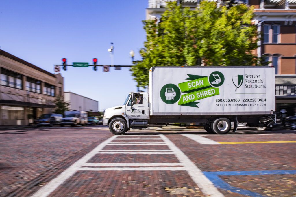 shred truck going through town